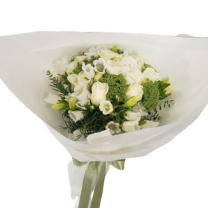 large bouquet of white flowers gift wrapped with white paper and sage green ribbon including white roses canterbury bells rosemary and queen anne lace
