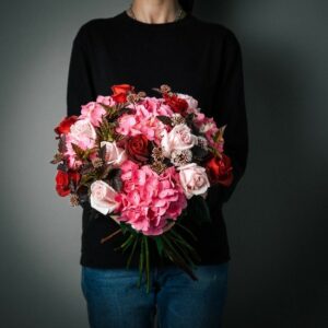 A bouquet of pink and red roses